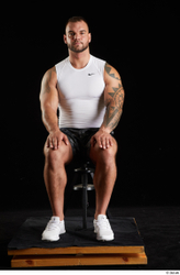 Whole Body Man White Sports Shorts Muscular Sitting Top Studio photo references